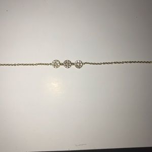 14k gold plated bracket with white diamonds